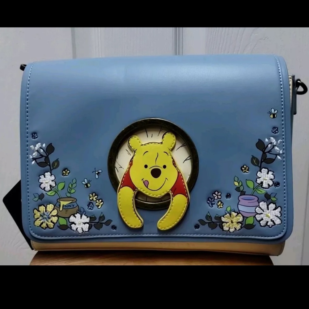 Winnie the Pooh Loungefly (2 marks on bottom)